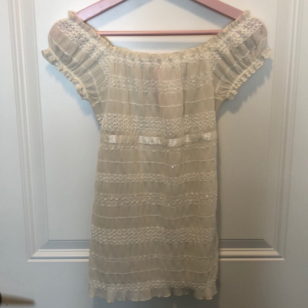 NWT Elegant ivory colored top.